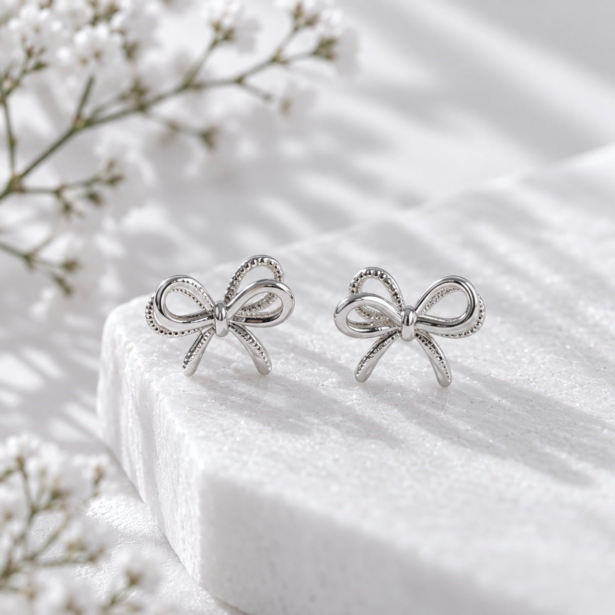 Arielle Bow Earrings — 925 Sterling Silver - YUNDIA